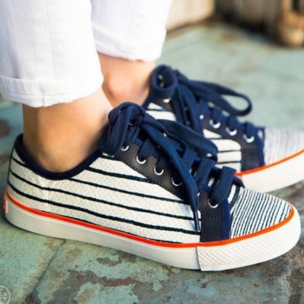 Tory Burch Millie sneakers. Navy blue and white with orange accents.